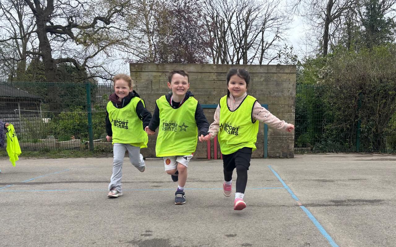 children running, holding hands